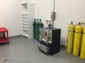Breathing air compressor and storage system and oxygen storage room